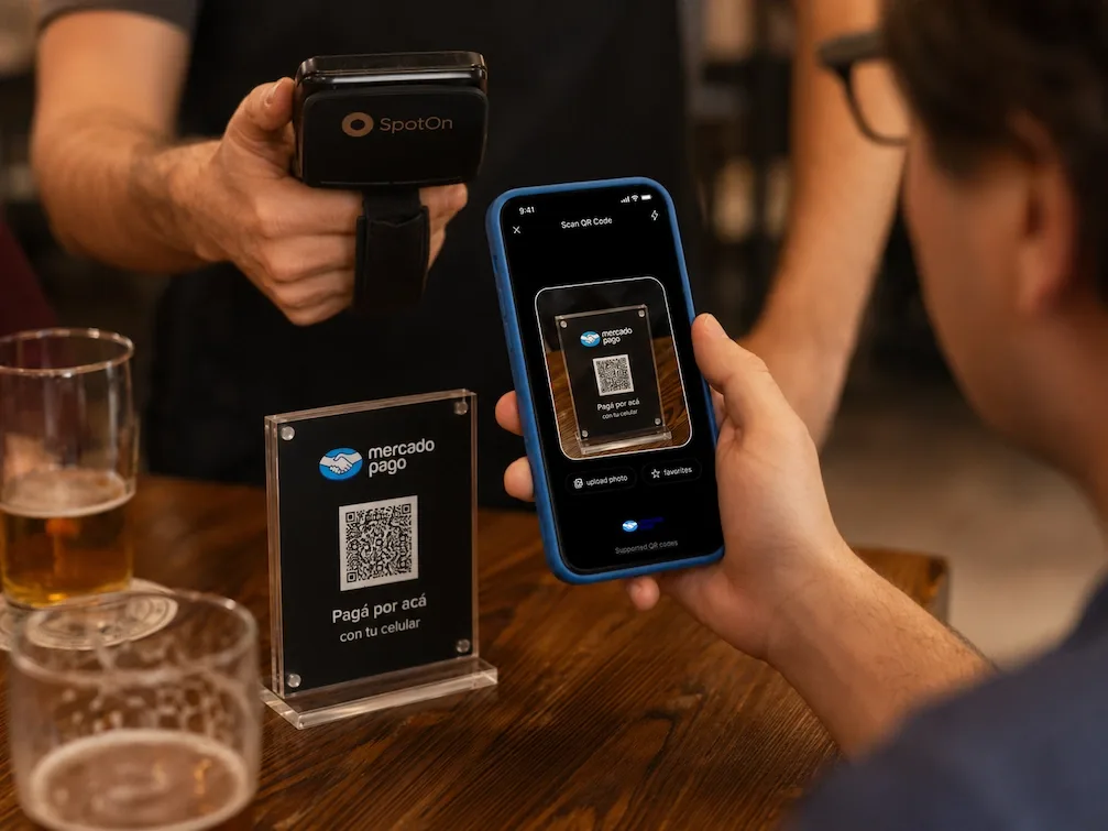Scanning a Mercado Pago table QR with a phone in a Buenos Aires bar